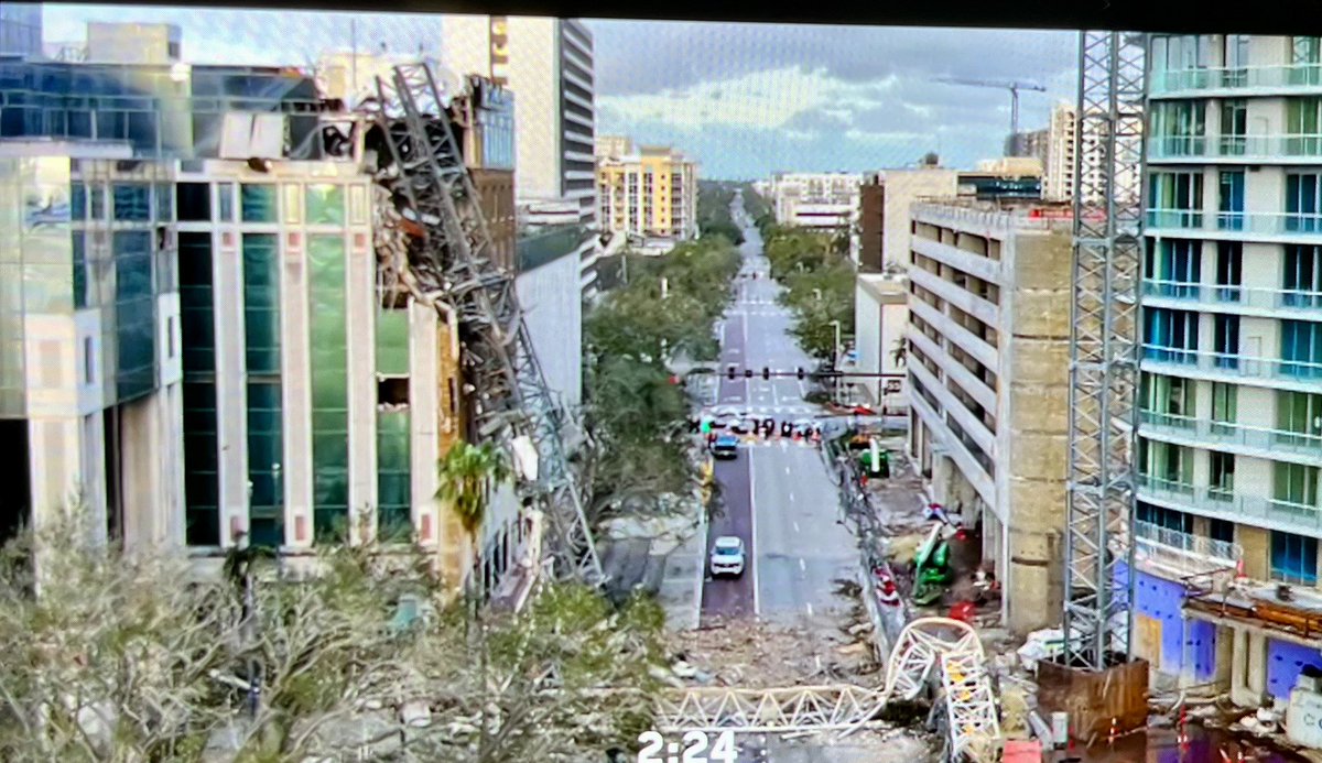 StPetePD's tweet image. First Damage- Here’s a Quick Look at some of the damage to the Trop and a downtown crane at 400 Central Avenue.
Due to the crane, streets are closed from 1st Ave North to 1st Avenue South and 3rd St. To 5th St. Avoid this area.