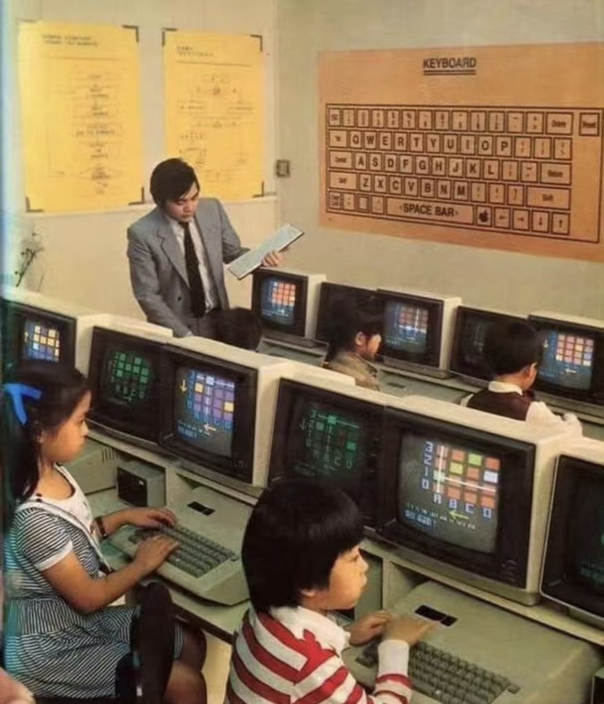 Taking computer class, a primary school in HK, 1984.
