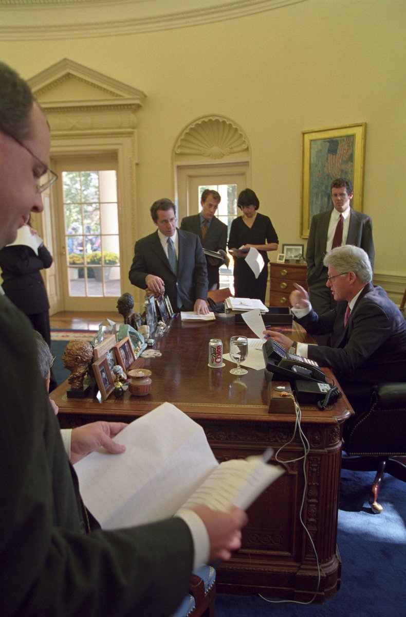 President William Jefferson Clinton is seen participating in a briefing for an upcoming budget statement in the Oval Office of the White House. He delivered the statement later that day in the Rose Garden.
