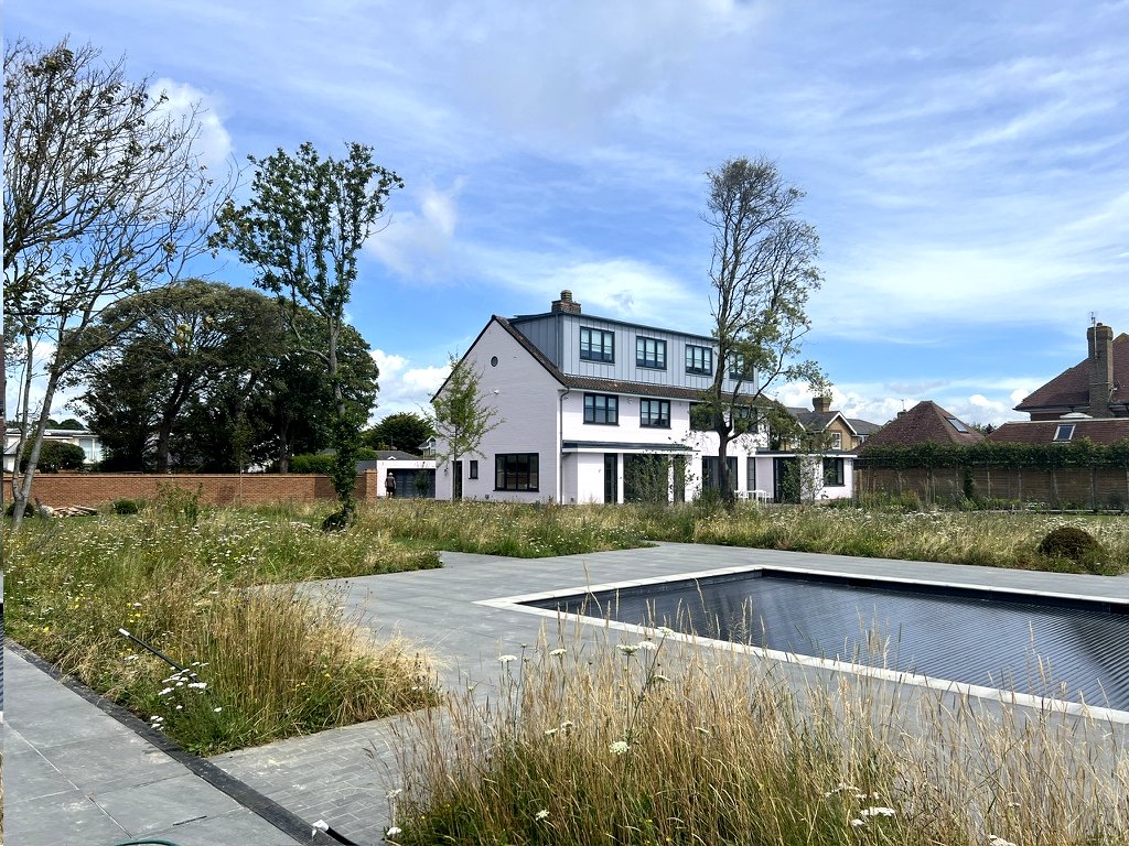 This is a house we worked on over a year ago, and it was still very much a work-in-progress at that point.  It's great to see how everything has come together.  The Greencoat PLX metal in colour Quarry Grey was used here and we think it ties in perfectly.  #metalroof #scmr