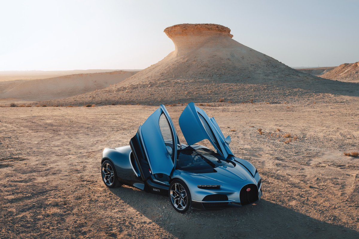 Bugatti's tweet photo. A stunning Doha debut for the TOURBILLON in the Zekreet Desert. BUGATTI showcases the pinnacle of excellence.

#BUGATTI #BUGATTITourbillon
–
https://t.co/mCEE0gi604 https://t.co/OV32nvqUfr