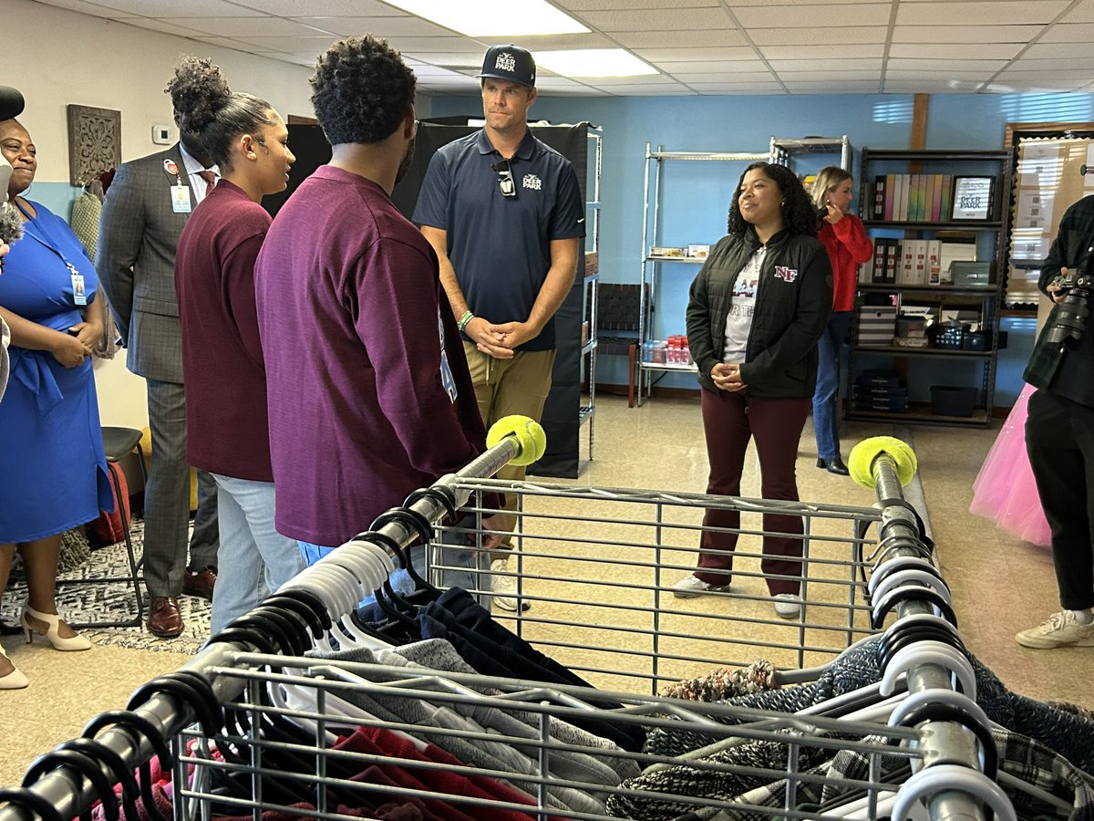 wsfcs's tweet photo. 🏫💙 North Forsyth’s Chic Shack is reopening, and they’re excited to have @gregolsen88 present a check from @DeerParkWater to help restock the shelves! Students can also look forward to more items donated from the fair! 🎁 #ChicShack @NoFoVikings #WSFCS https://t.co/zcEp6P52IL