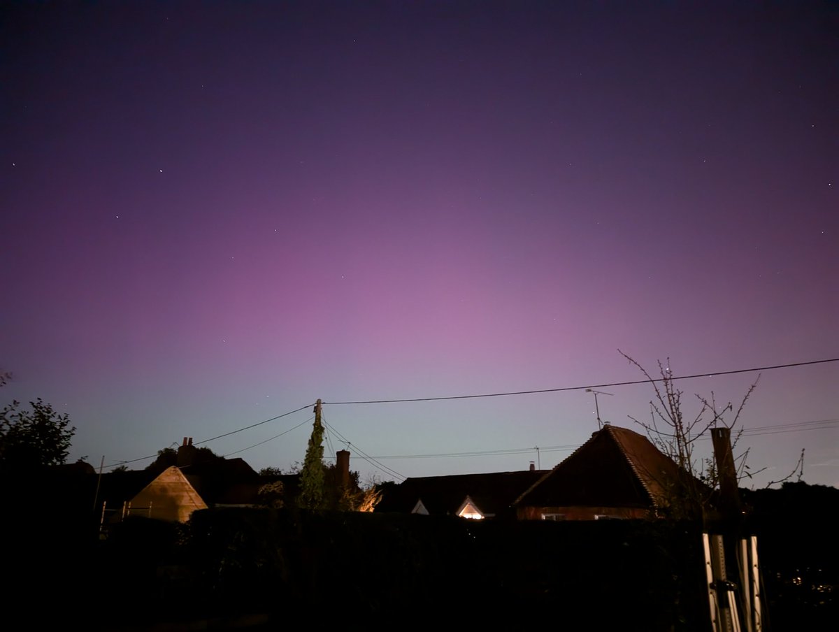 Aurora visible now in southern England...