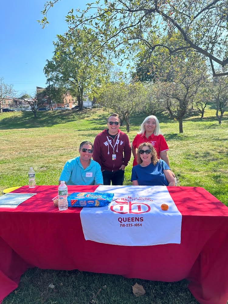 Here we are with Rich McLaughlin, (Music) Program Director for WFUV Public Radio, our favorite music radio station!  It was a quiet moment behind us as there were over 4,000 visitors at the Queens Botanical Garden.