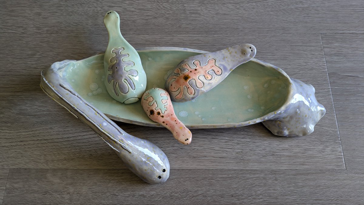 New #SciArt! This is a collaboration with my husband Ryan Null, who adores leeches. He designed this plate with the spoons (the baby leeches), and I built it from clay. We picked the glazes together. I am so in love. #annelids #leeches #ceramics #hanbuiltceramics #handbuilding