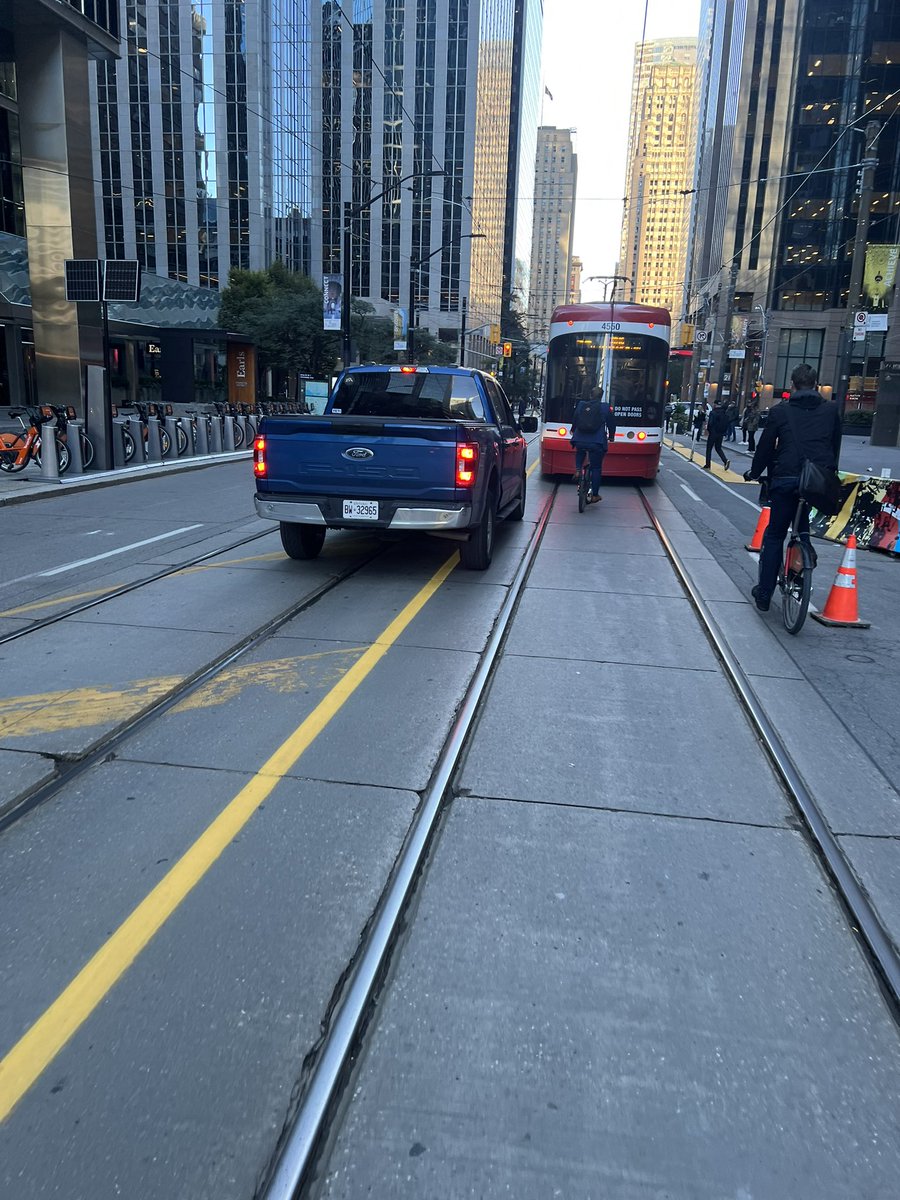 <a href="/TheBikingLawyer/">The Biking Lawyer (Dave Shellnutt)</a> <a href="/CycleToronto/">Cycle Toronto</a> Basically on a regular basis I have to endure open violence from drivers aggressively using their car as a weapon. 

This morning, the driver crossed illegally coming from west on King St University Av almost drove over me. 

Do I need to accept it?