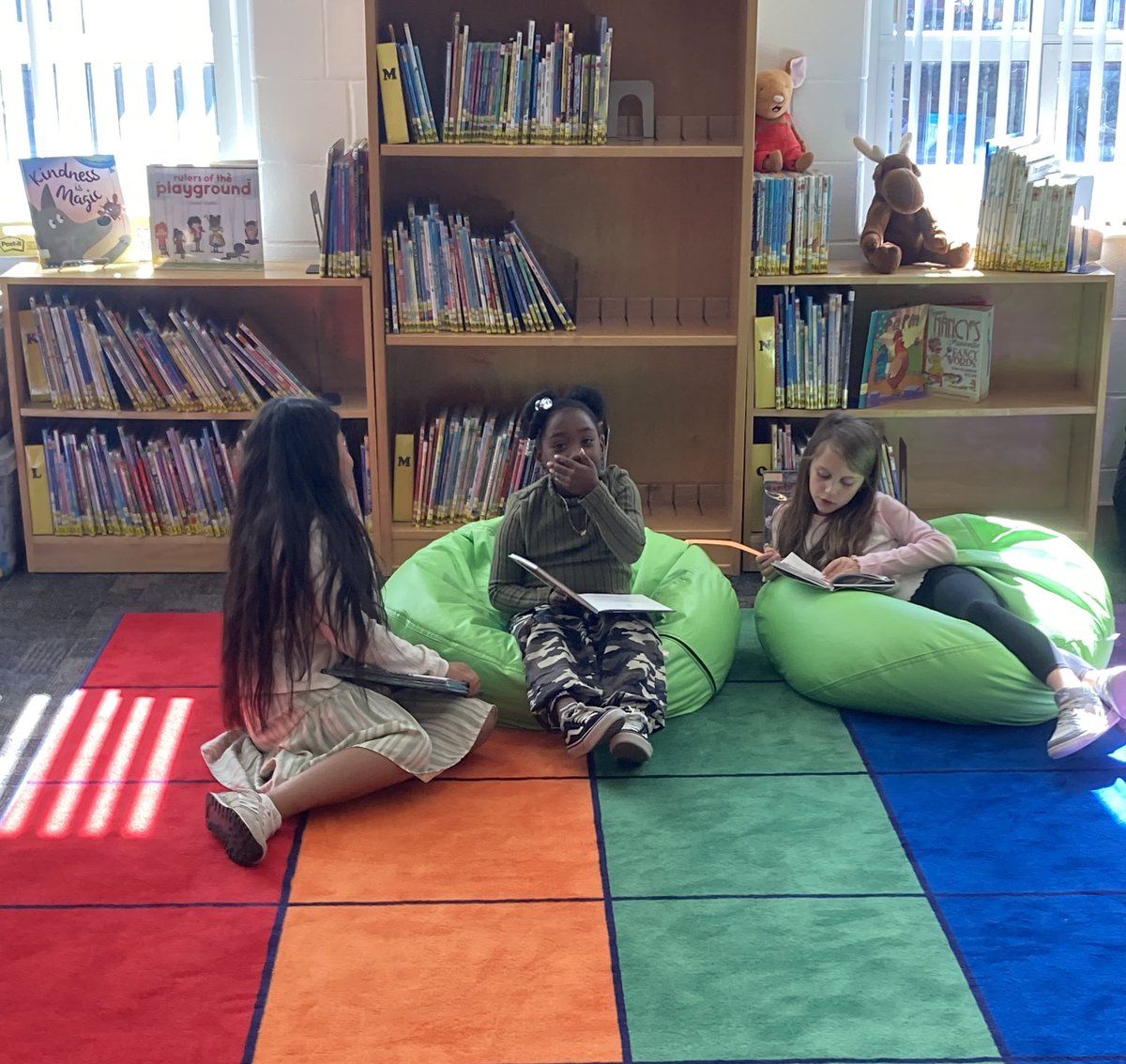 Just another day in the library.  I love seeing Ss enjoying their books. ❤️ <a href="/BaysideBulldog/">Bayside Bulldogs</a> <a href="/Amanda_LoydVB/">Amanda Loyd</a> <a href="/MsOConnor33/">Amy O'Connor</a> <a href="/LaceyDetlor/">Lacey Detlor</a> <a href="/vbschools/">VBSchools</a>