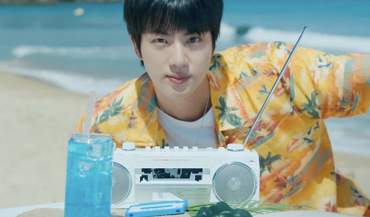 WORLDMUSICAWARD's tweet photo. #Jin looks so handsome in new #SuperTuna Special  video....👏📻🎣🐟🏖️✨💫🌟👑💛💙
💜 Found out my rival was a tuna😂😂😂 I’m going crazy🐿️ 

WATCH:  https://t.co/gCXb34lelU… https://t.co/cEwls0O36E