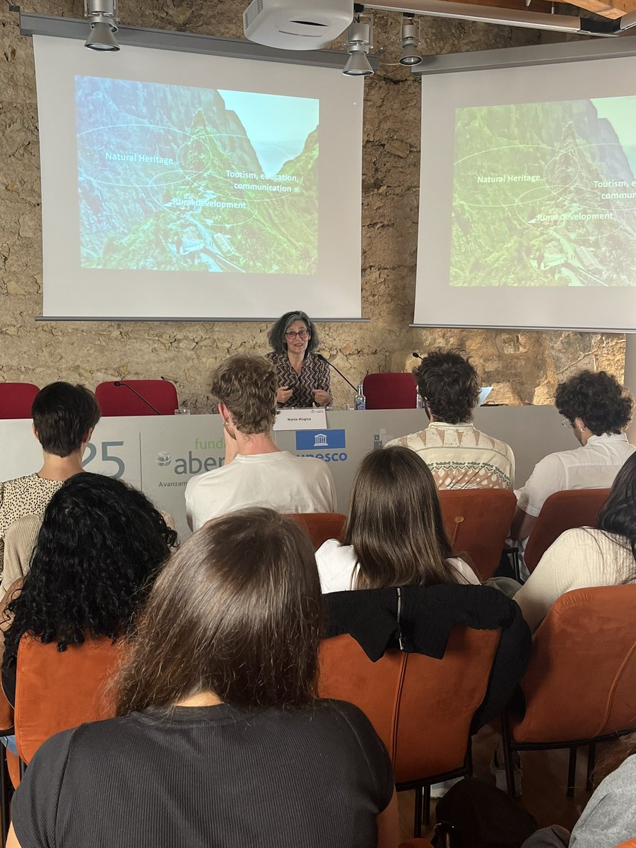 ctforestal's tweet photo. “Protected areas are long-term social projects, privileged places for learning &amp; acting about climate change, nature conservation, and good governance” said Dr. Marta Múgica, director of @FUNGOBE &amp; @redeuroparc, during her inspiring lecture at #UNESCOMED to the @ICTA_UAB students https://t.co/ySjVu1PaYM