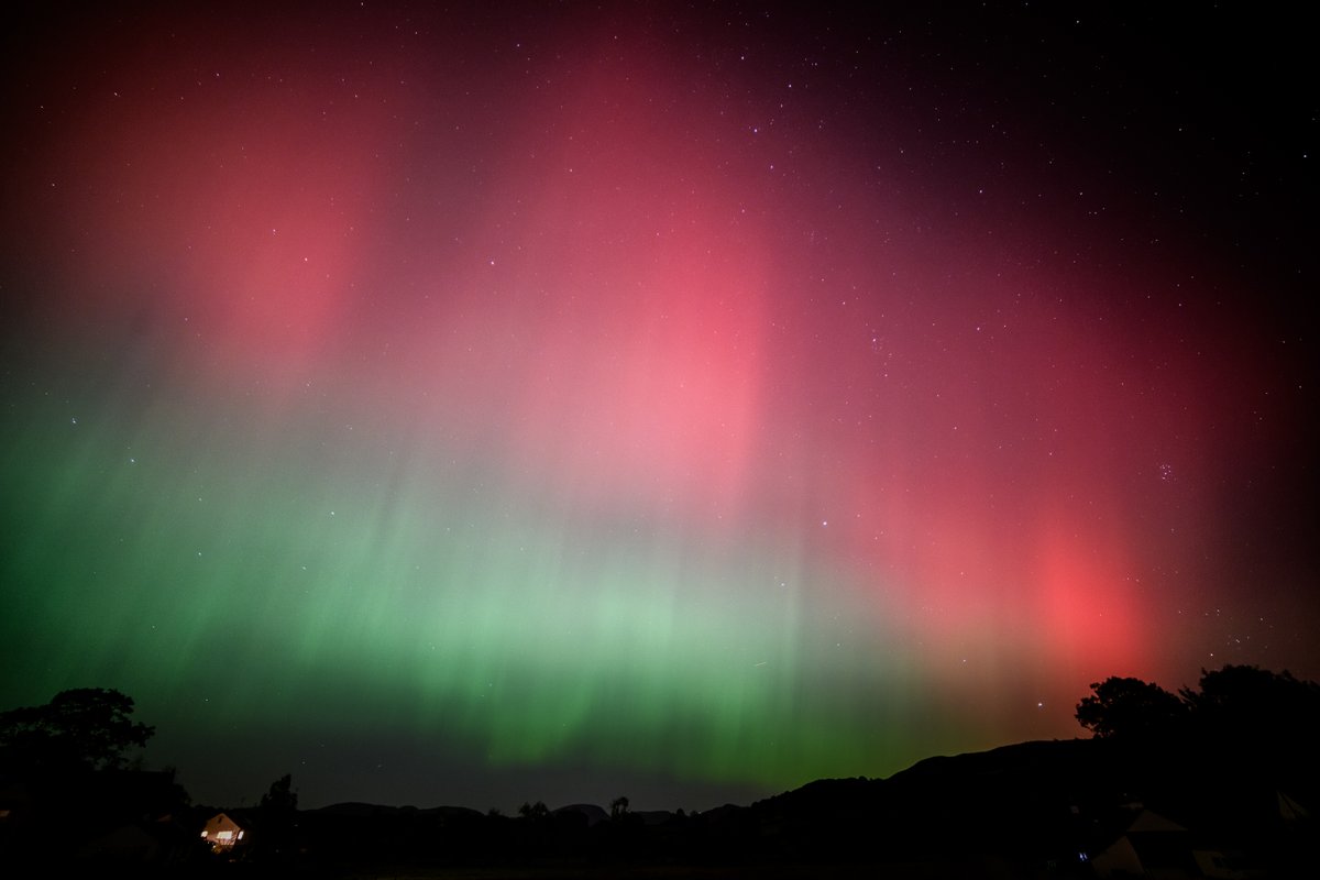 VisitHawkshead's tweet photo. The aurora over our little village and surrounding hills was spectacular last night! #VisitHawkshead #Hawkshead #LakeDistrict @lakedistrictnpa @cumbriatourism @LakesCumbria @CumbriaWeather @golakes @TheLakesGuide @hiddencumbria @ShowcaseCumbria #PhotoRippin @FriendsofLakes https://t.co/wsZSNAgIsJ