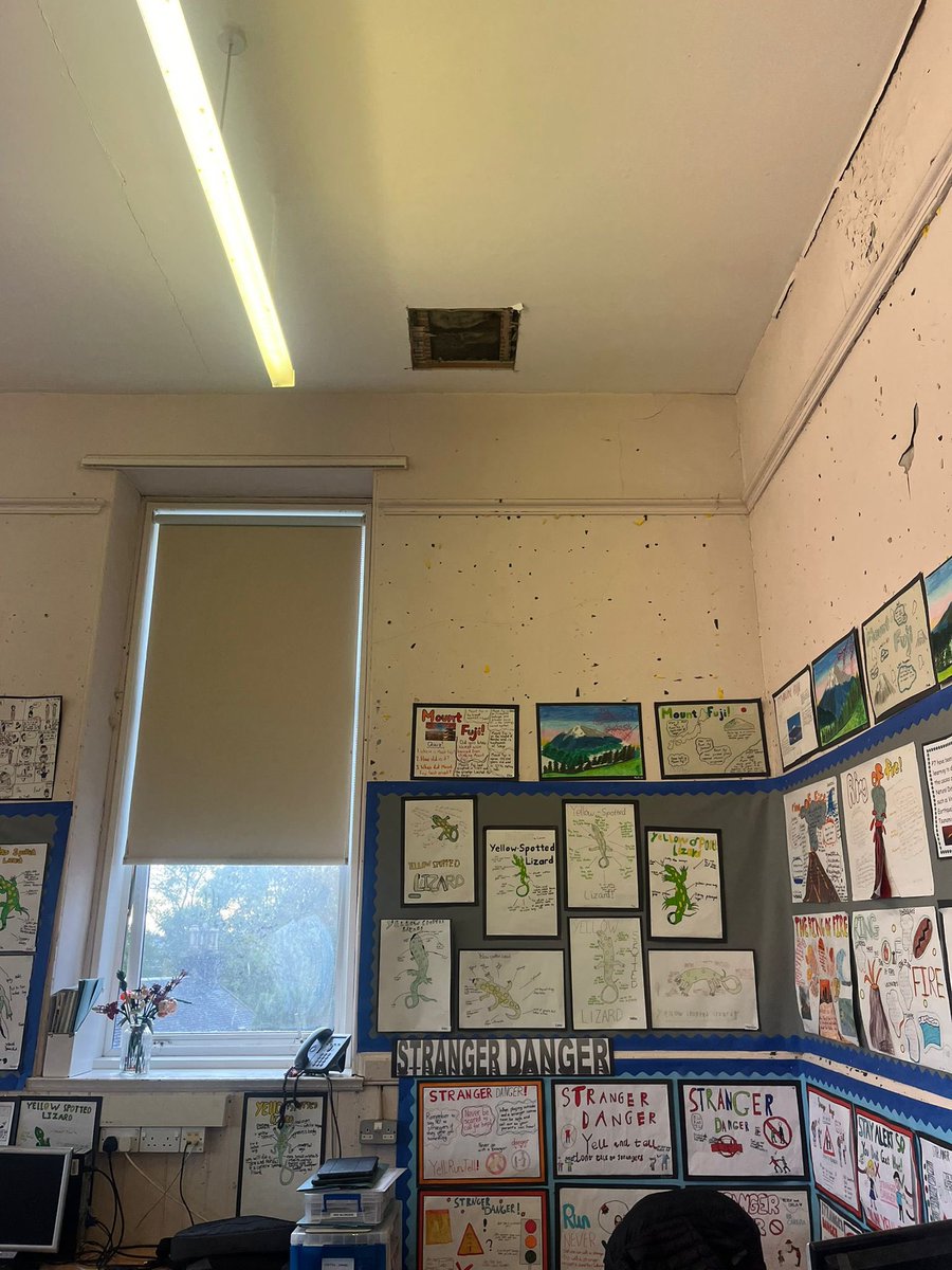 MPParentCouncil's tweet photo. A section  of ceiling fell in a P7 classroom at Milngavie Primary yesterday and almost hit the teacher.

How can @EDCouncil say the school is safe when things like this happen?

They need to take action now to #repairandprotect the school. https://t.co/LpXtTyFAjy