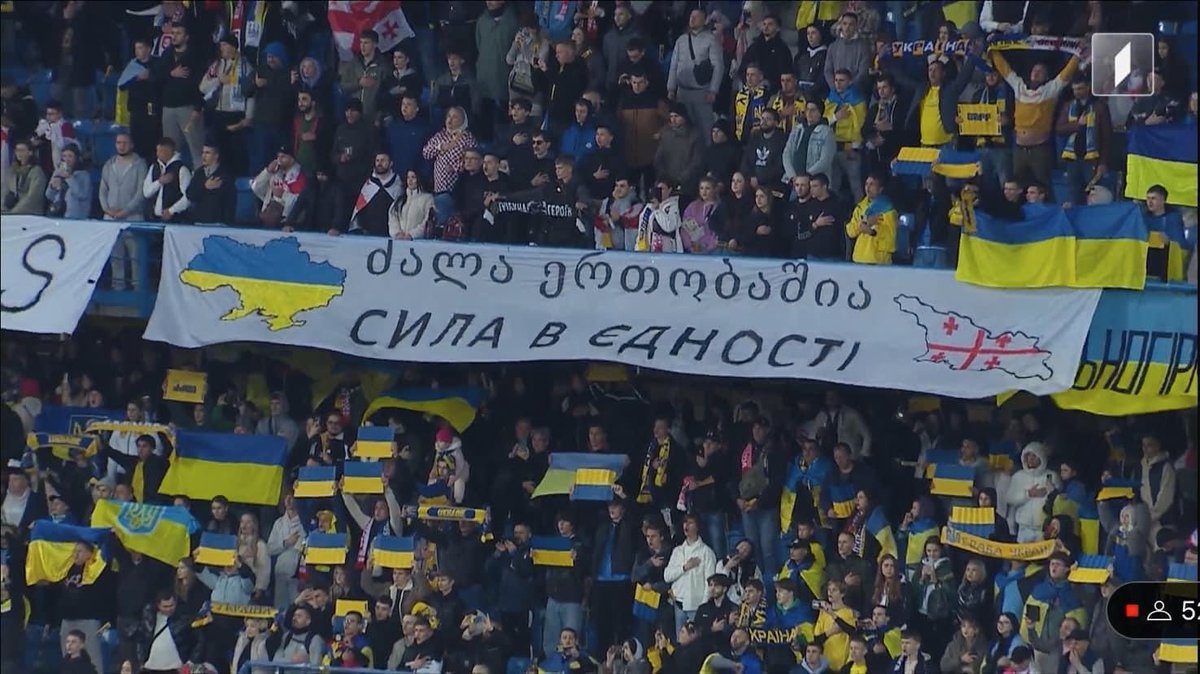 Tsintsadze_a's tweet photo. Today, during the UEFA Nations League match between Georgia and Ukraine, supporters are rallying around the main slogan - “Strength is in unity.” This slogan stands as an integral part of Georgian identity, spirit and solidarity.
ძალა ერთობაშია 🇬🇪🇺🇦
#Georgia 
#Ukraine https://t.co/Dx88q0MrJR