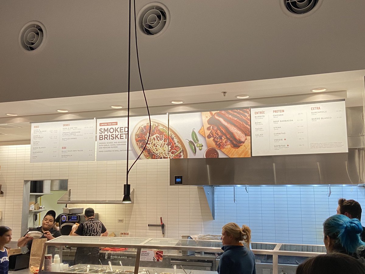 JeffGBeckman's tweet photo. @ChipotleTweets Hey Chipotle, here seeing all the menu space promoting smoked brisket. Yet no price posted anywhere. Fully one half of the menu board is dedicated to this LTO. Love the lack of transparency. OK, not really. Do better. https://t.co/Ce3FGf4dvF