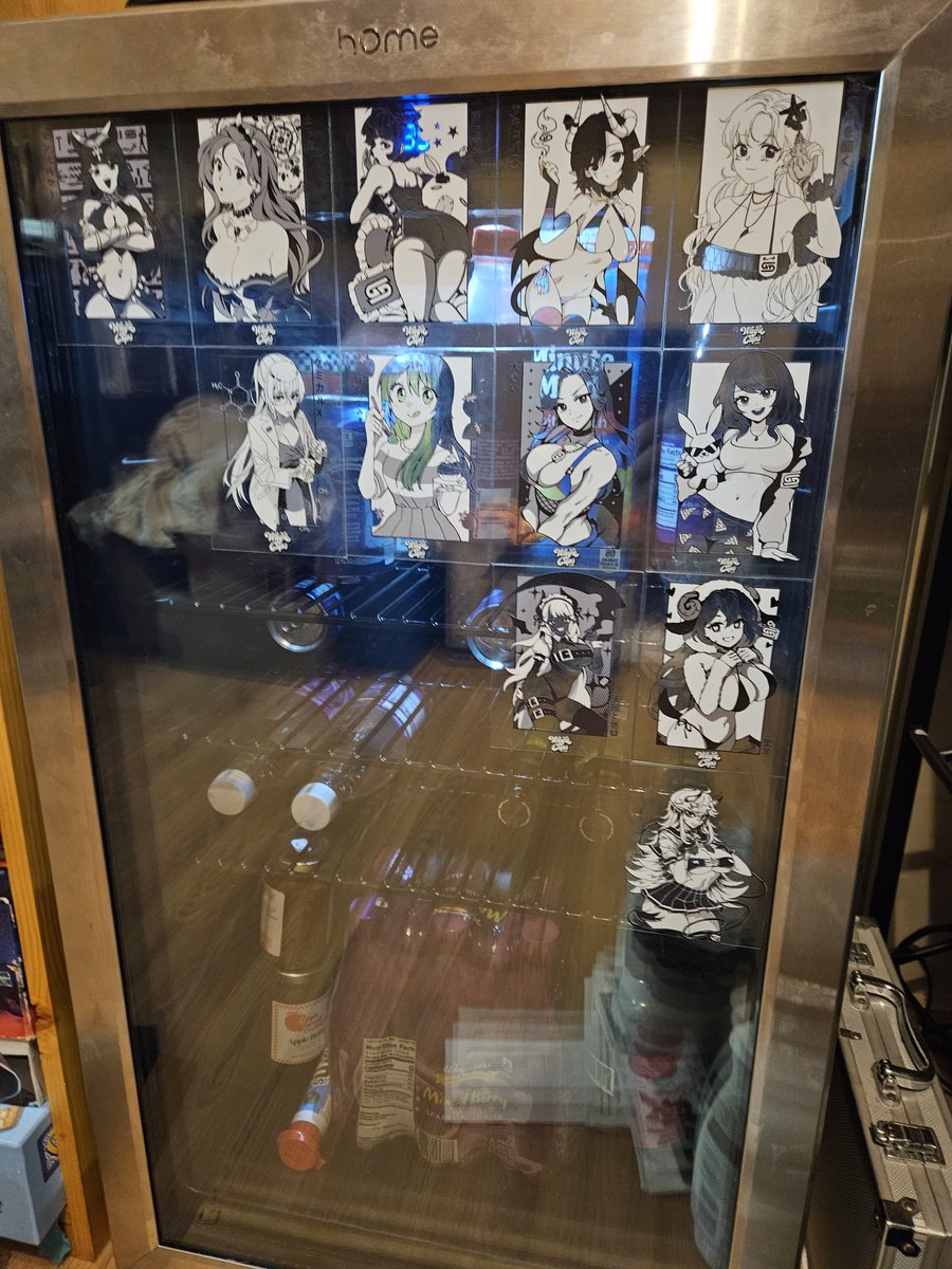FroRaptor's tweet photo. Dunno if I've shown you guys the waifu fridge yet. 
I like to use the sticker i get from each @GamerSupps waifu cup and add it to the front of my mini fridge so I can always have them guard my beverages. I'm trying to fill the glass.
Hope you like it! https://t.co/f8Jr5LBIhz