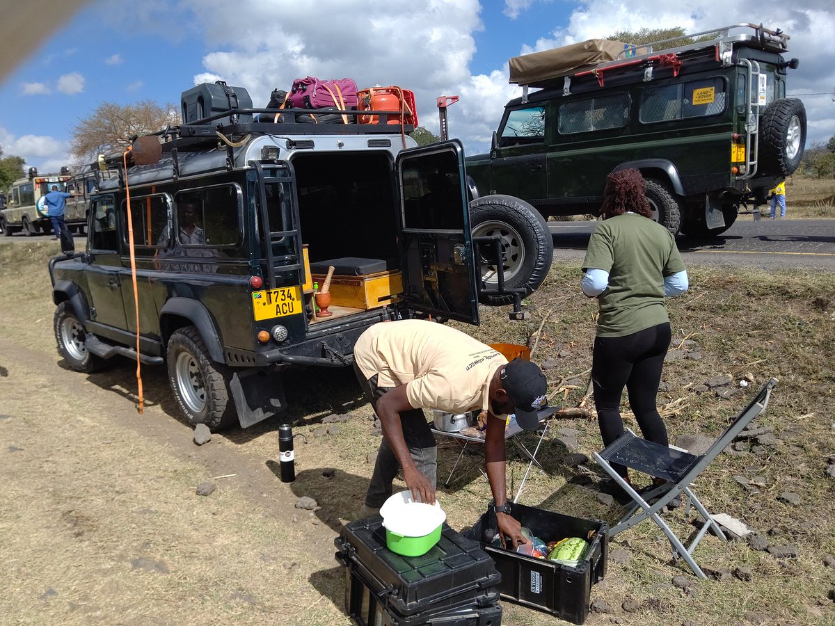 As we are on our day one of  Landrover Festival Arusha 2024, participated by most of East African land rover Enthusiasts. 
Here i am, prepairing my breakfirst along  the road side as we que up to parade ground.
Aim is to break Geinness World records. 
Would we archieve???