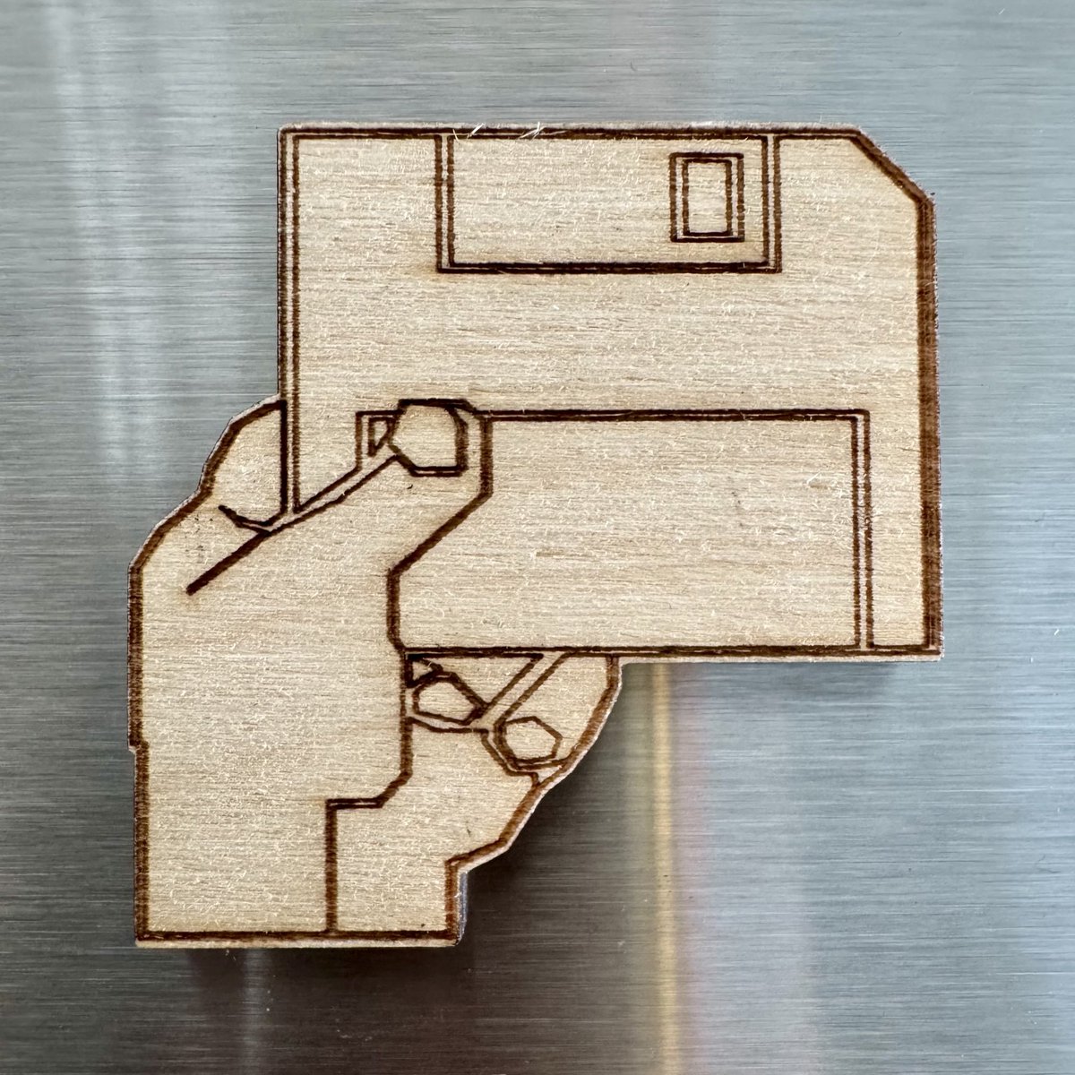 derPUPE's tweet photo. Pimping up our #fridge with wooden #Amiga  #C64 &amp; #HeartOfGold 🚀 

Thanx #demoscene &amp; Thx #Gnumpf crew https://t.co/sq0UHmJzae