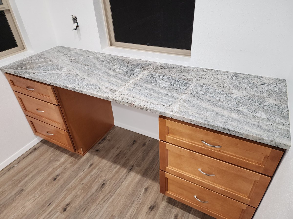 I haven't spoken much about it here, but I have been in the process of of having a house built for the better part of two years now. I'm on the final stretch and got my countertops in yesterday. I'm currently a very giddy geologist!