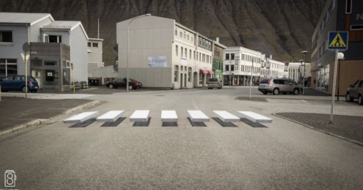 TrungTPhan's tweet photo. This “Floating Crosswalk" in Iceland was an interesting idea: painted on the street to look 3D from all angles (meant to slow down traffic). https://t.co/i1roYeVnF8