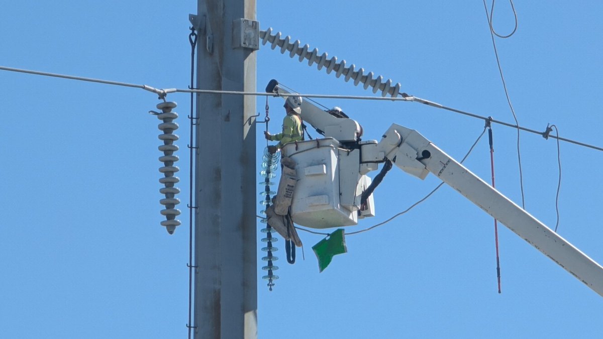 Crews are working along Bay Pines Blvd in St Pete near Bay Pines bridge to repair equipment on two transmission poles damaged by #HurricaneMilton . These lines serve many customers in the region so getting them repaired will help other restorations in the area