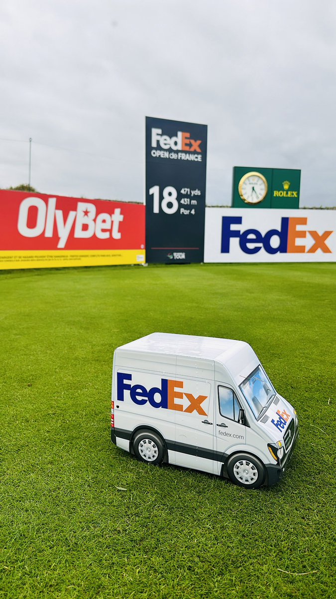 JallalTurf's tweet photo. Loving these creative tee markers shaped like FedEx trucks at the Open de France! Adds a fun twist to the course while staying on brand. 🚛 ⛳️#Golf #OpenDeFrance #FedEx #TurfBoy #DpWorldTour https://t.co/v2csaOfK6E