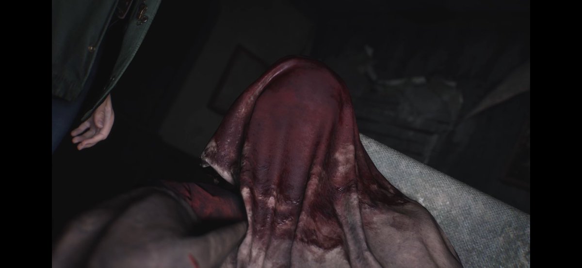 JOHNxW1CK's tweet photo. @N4KEDSNAKE_ @Mateusz_Lenart_ What about the one in the recliner in front of the tv covered? Kinda looks like Harry Mason before Heather found him home (in SH3) Looked like the same fit too🤔 https://t.co/xHLdKA18Fr