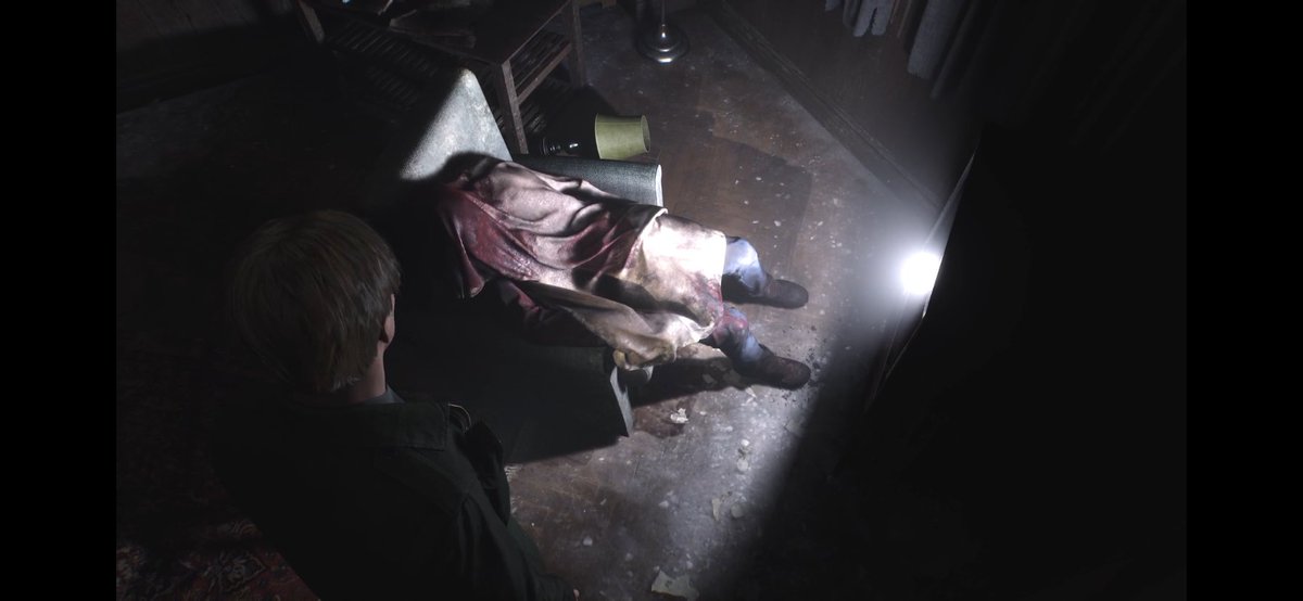JOHNxW1CK's tweet photo. @N4KEDSNAKE_ @Mateusz_Lenart_ What about the one in the recliner in front of the tv covered? Kinda looks like Harry Mason before Heather found him home (in SH3) Looked like the same fit too🤔 https://t.co/xHLdKA18Fr