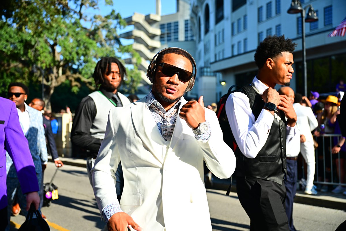 LSUfootball's tweet photo. Tiger Walk Suits 🤌 https://t.co/Qh12ok23xl