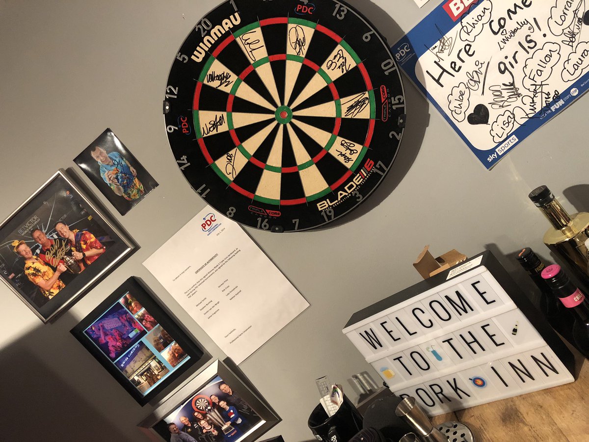 bendorkins's tweet photo. Entered a competition whilst playing a game against @ColinJawsLloyd in Blackpool during World Matchplay in the summer and won a signed dartboard. Now in position in the bar 👍 - thanks to #mrvegas #officialpdc https://t.co/2irWFexBa0