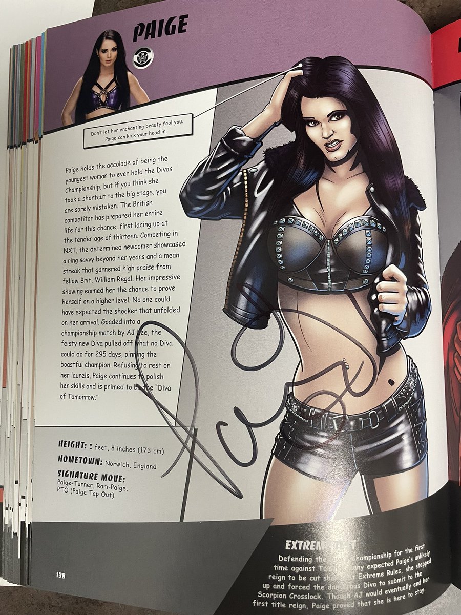 mshappyladybug's tweet photo. @imahotmess4U I have this book I got at WM 31 at I got @Saraya  (Paige) , @TheAJMendez  and @WWERomanReigns to sign it https://t.co/Gv3QGCfttD