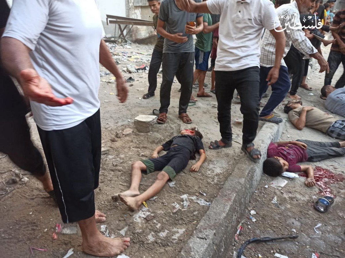 MosabAbuToha's tweet photo. A new massacre this time against five children in Al-Shatie Camp while they were playing near a cafè. https://t.co/wmrHzIDqiZ