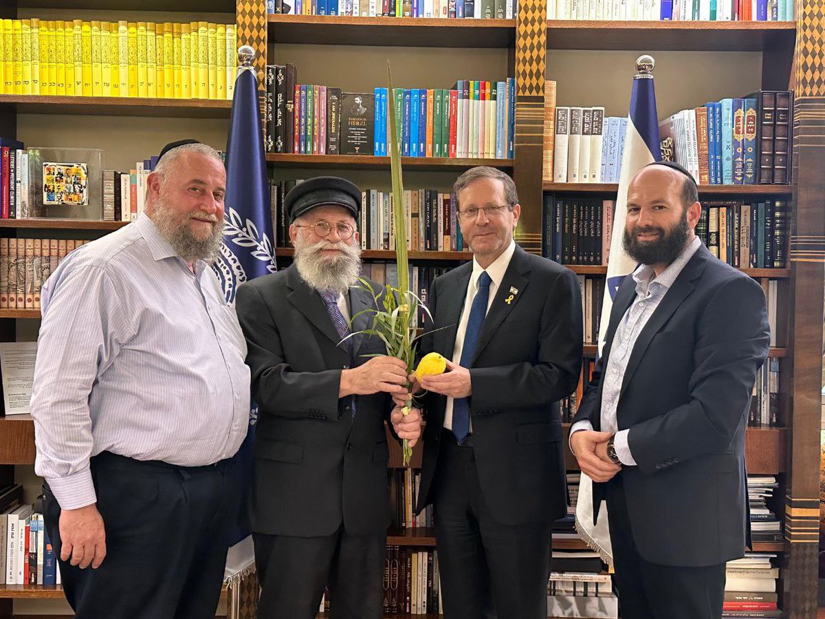 IHF_Heritage's tweet photo. Israel President Isaac Herzog welcomes Rabbi Yaacov Gluberman, his son Rabbi Bezalel & Rabbi Zalman Wolf from Kfar Chabad, receiving the Four Species. He praised Chabad's significant contributions and commitment to Israel. #Chabad #Israel #FourSpecies #Sukkoth @Israelcohen911 tweeted (Hebrew)