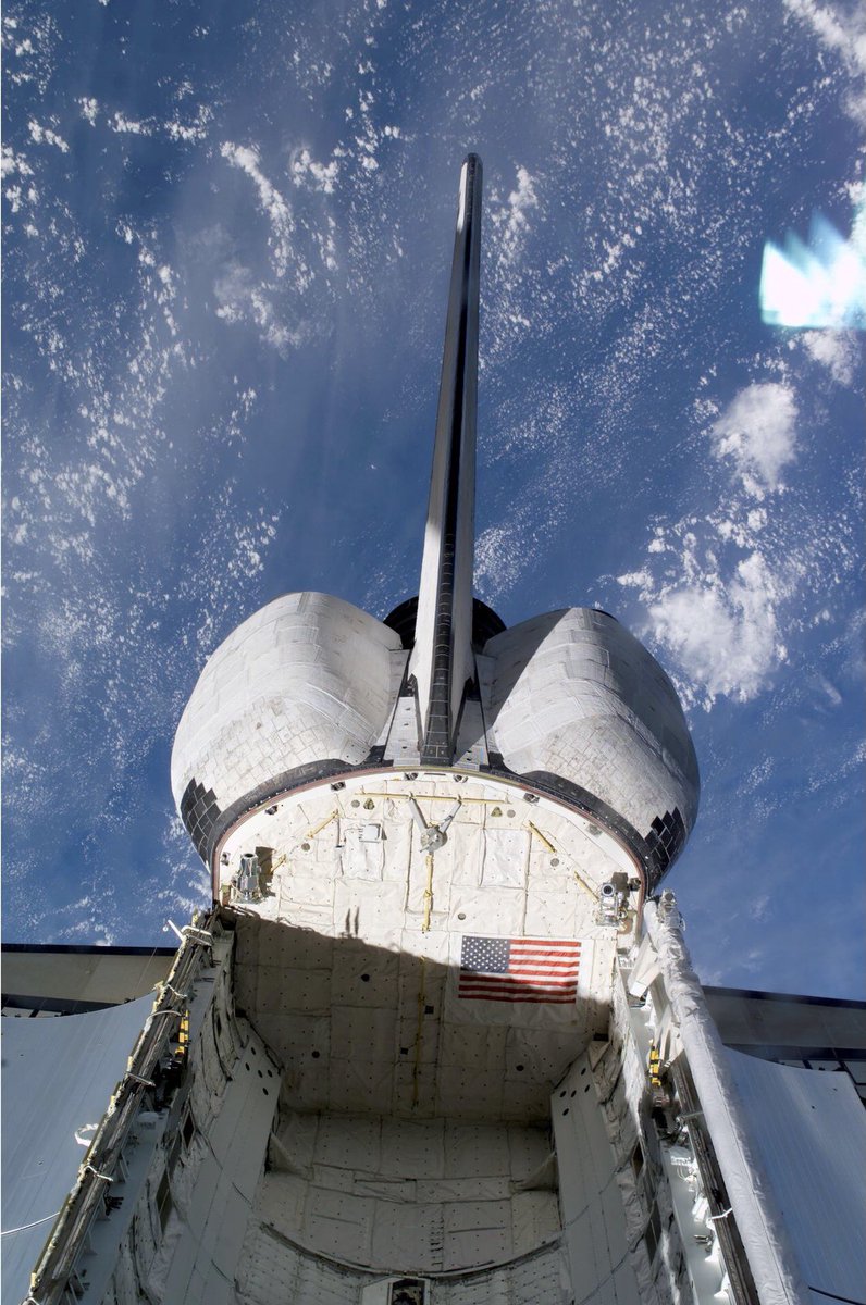 Boneyardsafari's tweet photo. #otd 13 October 2002, Atlantis OV-104 payload bay and vertical stabilizer are backdropped against a blue and white Earth. Atlantis was docked with the International Space Station (ISS) at the time. #orbiteratlantis #ov104 #spaceshuttleatlantis #nasa #iss #aviationsafari https://t.co/0L0IfQBdd5