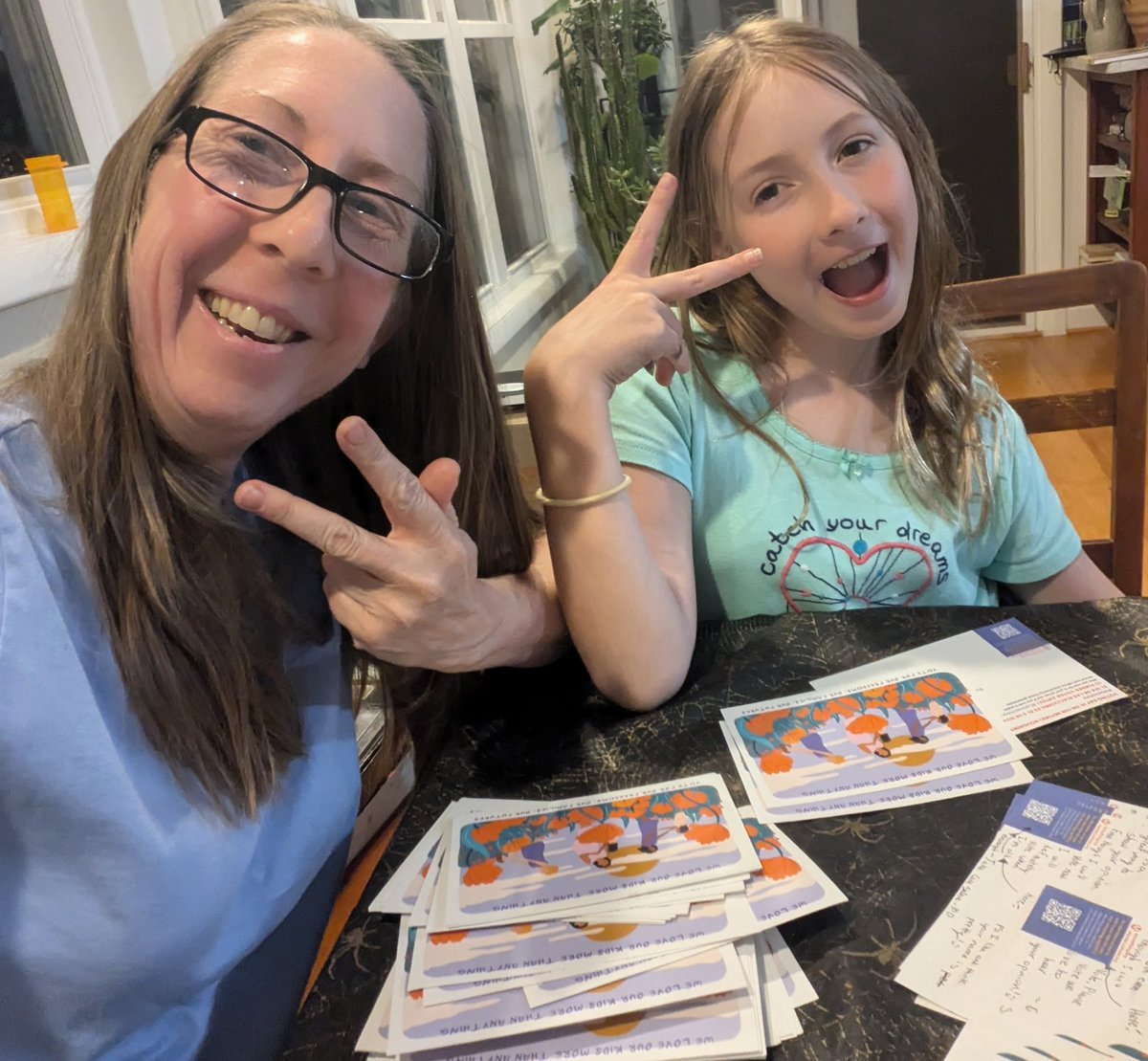 Doing our girl scout duty encouraging #MomsVote by sending postcards for <a href="/MomsRising/">MomsRising</a>.