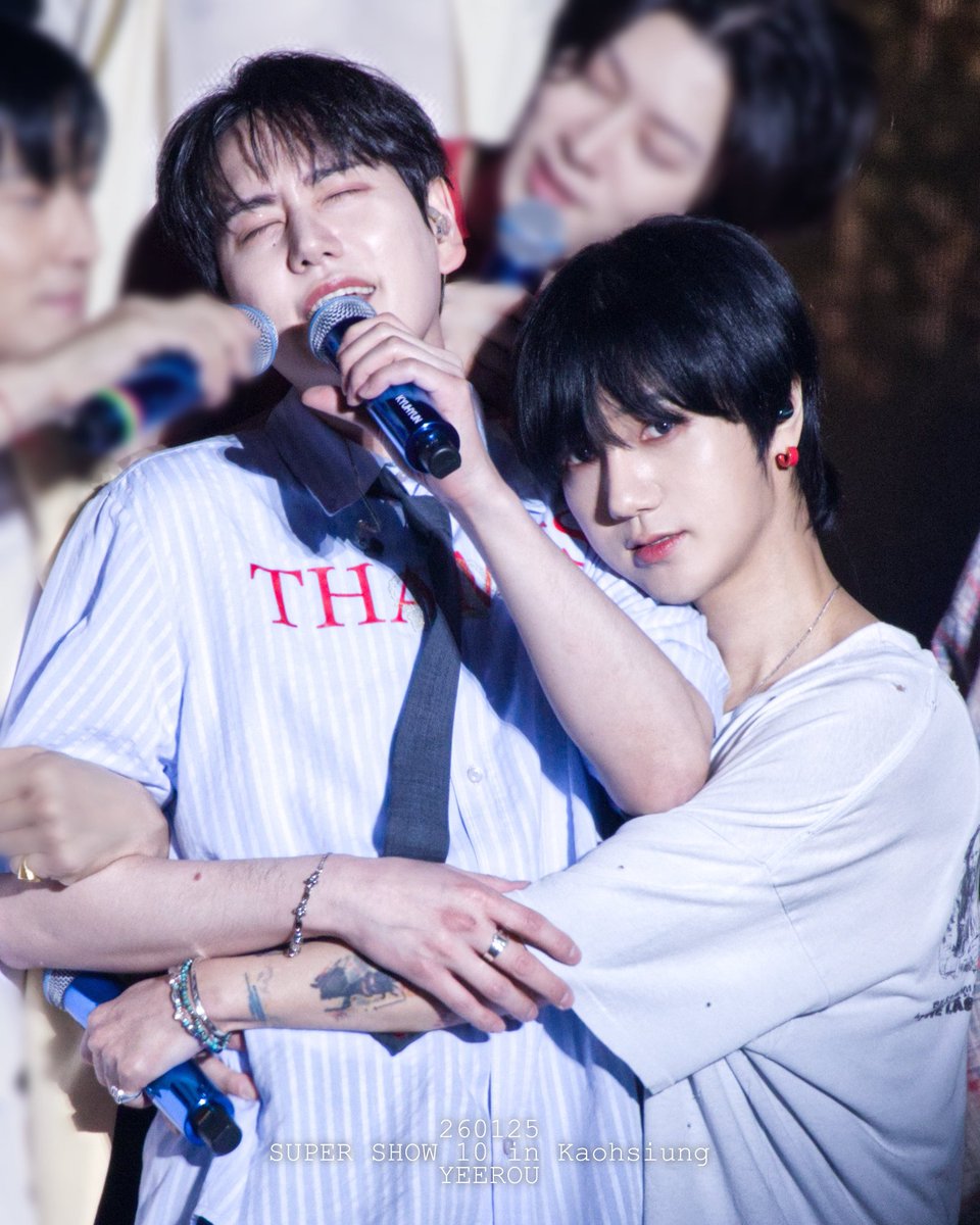 The way Yesung stares into our soul as if to say, 'Only I get to hug Kyuhyun like this. Jealous? What are you gonna do about it?'"