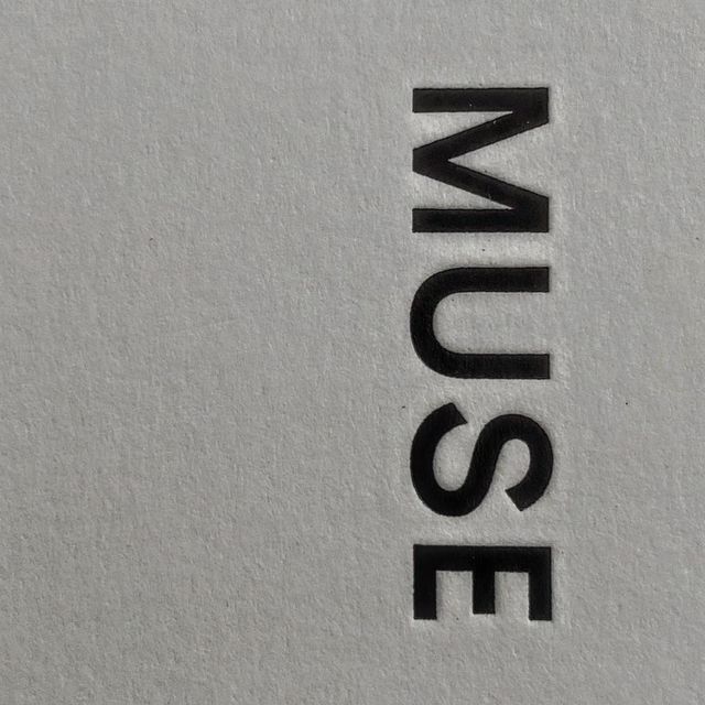 Toehynug's tweet image. Snow-dappled fur that clings like winter's wild whisper to bare skin, a figure reclines with effortless dominion—midnight strands tumbling across a gaze half-lidded in quiet reverie, fingers adorned in Cartier's crystalline gleam tracing the edge of parted lips as if savoring.