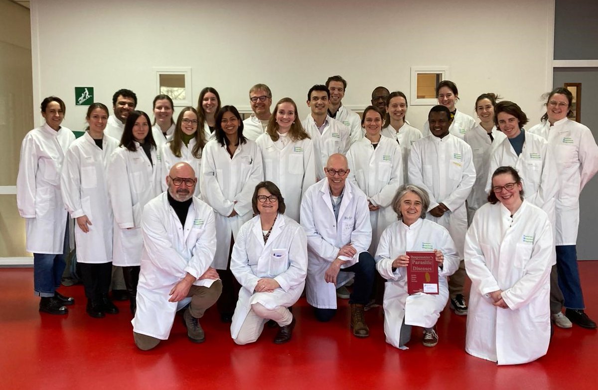 PWB_Global's tweet photo. We gifted a copy of the Big Red Book to Dr. Lisette van Lieshout, Associate Professor in Medical Parasitology at Leiden University Medical Center (LUMC). She recently reached out to share this photo of her students with the book. “Many thanks again for gifting me the Eighth Edition of Parasitic Diseases at the last ASTMH meeting in Toronto,” Dr. Lieshout wrote us. “I’ve already put it to good use during our post‑graduate course in Clinical Parasitology here in Leiden, the Netherlands.”