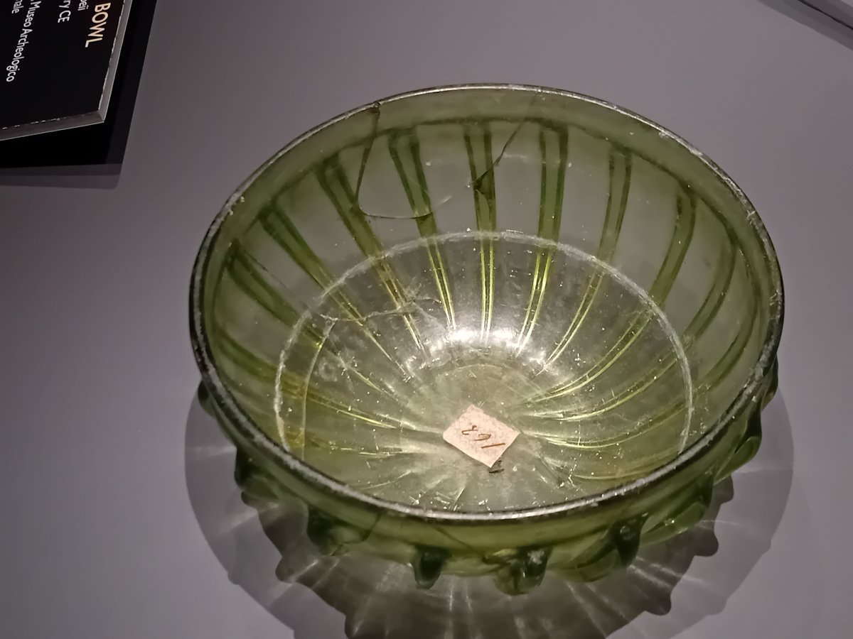 DrJEBall's tweet image. A #Roman glass ridged bowl, in a lovely shade of pale green. It was made about 2000 years ago &amp;amp; was found in #Pompeii