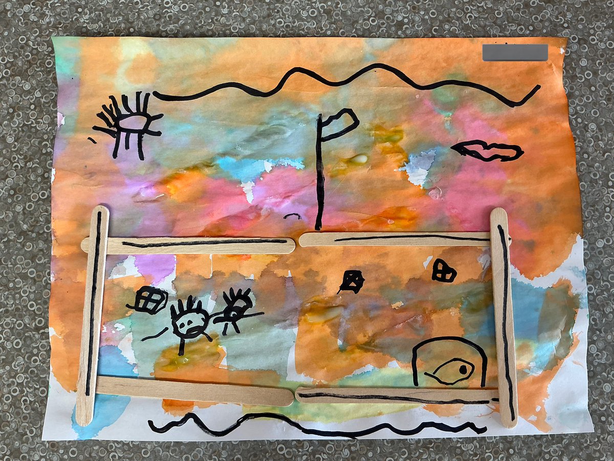 Inspired by the book ‘6 Sticks’ by Molly Coxe, K.J. created a unique picture of a school using six popsicle sticks.  “This is our school.  I put the Canada flag like our flag.  The kids are playing and doing UFlI.” said K.J.