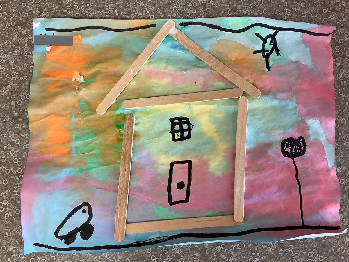 Inspired by the book ‘6 Sticks’ by Molly Coxe, M.M-R. created a unique picture of a house using six popsicle sticks.  “I made my house.  This is my car and tree.  You can get in the door and go upstairs.  I have a second floor.” said M.M-R.