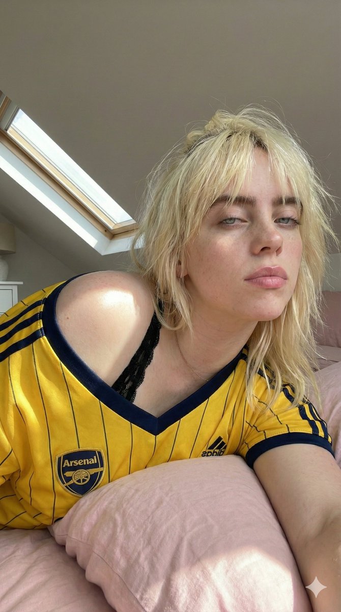 Candid Selfie in Soccer Jersey in an Attic Bedroom — example 2