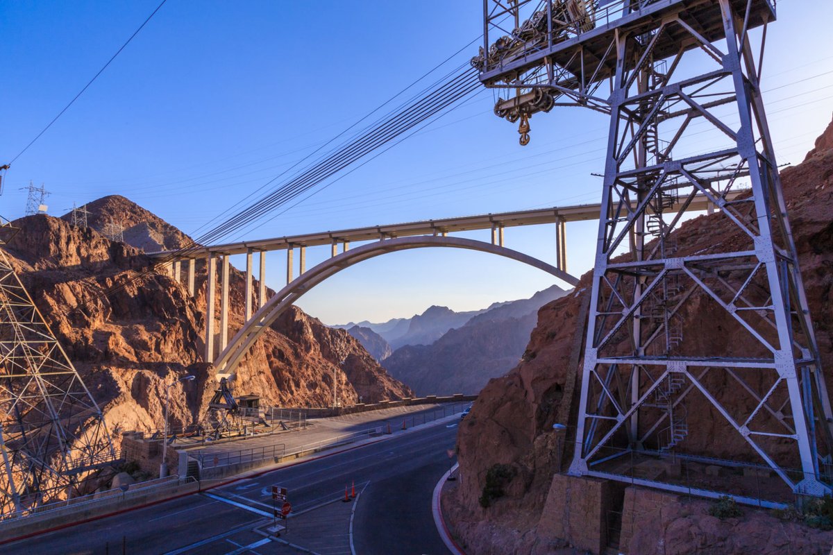 capbcon's tweet image. The Hoover Dam bypass wasn’t a bridge project — it was a risk-removal project.

The Mike O'Callaghan–Pat Tillman Memorial Bridge carries U.S. Route 93 270 m above the Colorado River, with a 579 m total length and a 323 m concrete arch span, making it one of the longest concrete…