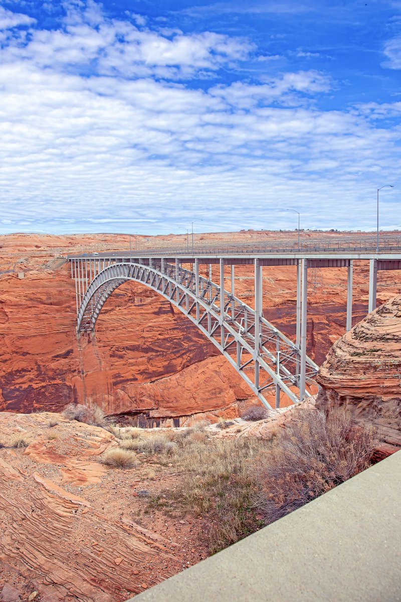 capbcon's tweet image. The Hoover Dam bypass wasn’t a bridge project — it was a risk-removal project.

The Mike O'Callaghan–Pat Tillman Memorial Bridge carries U.S. Route 93 270 m above the Colorado River, with a 579 m total length and a 323 m concrete arch span, making it one of the longest concrete…