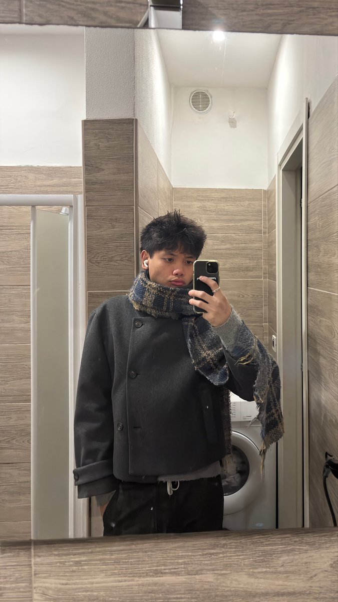 trench coat buttoned to the top 😛