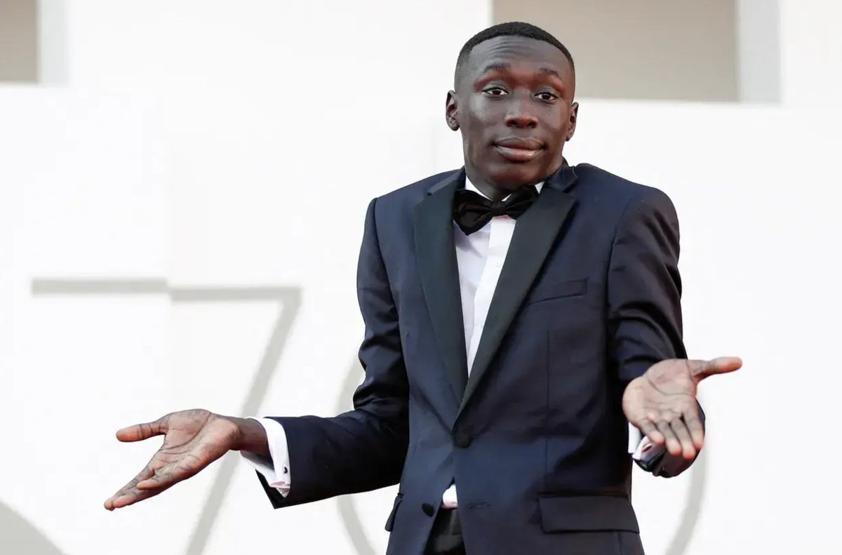 zaimiri's tweet image. Khaby Lame just retired at 25 for $975,000,000.

The company that bought it expects to generate $4B this year.

But Khaby didn't just sell his TikTok account.

He sold his entire existence.

The deal includes a scary "AI Digital Twin" clause:

He handed over his:

• Face ID
•…