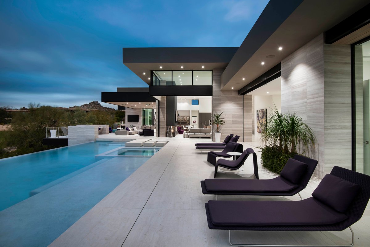 Stretching the length of the house, the outdoor living room is big enough to handle a crowd yet intimate enough for small gatherings. 

To enjoy the entire project, follow the link >> bit.ly/4er9zCZ
Follow @drewettworks for modernist regionally-inspired architecture.