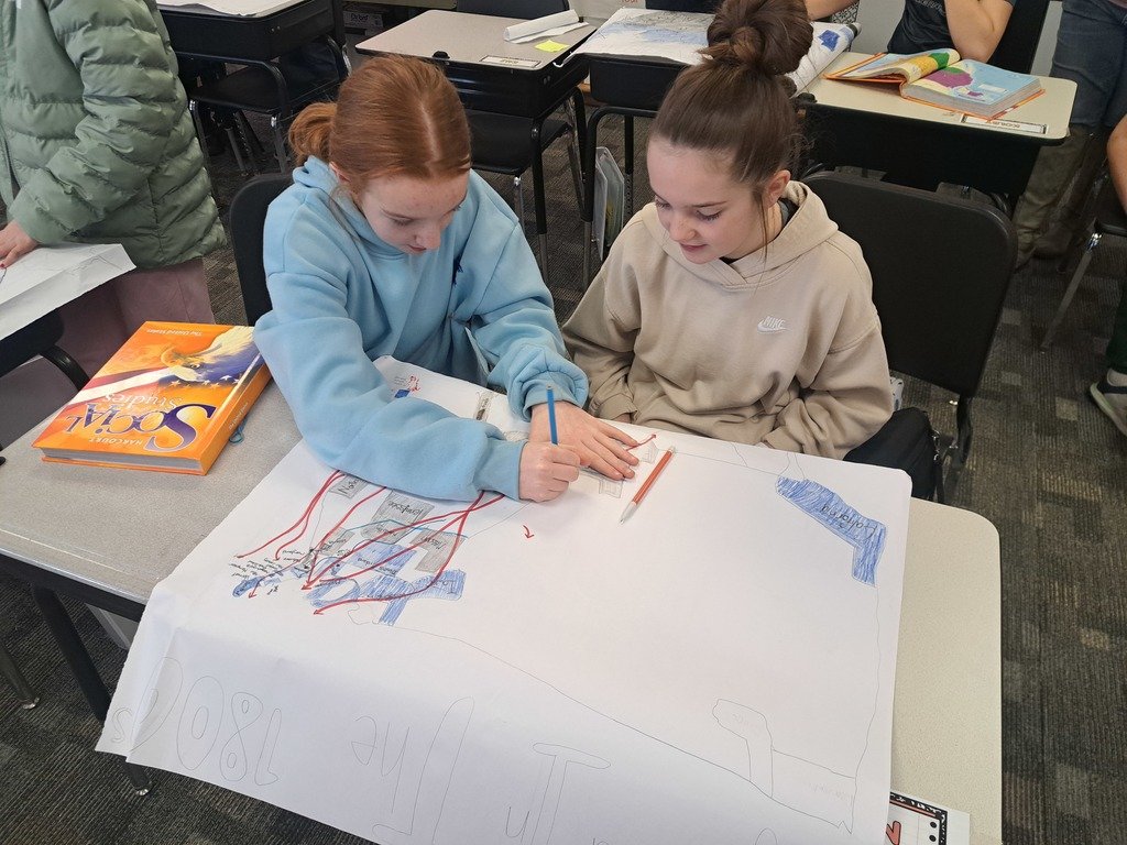 The 5th graders are reading the book "The Boys War" by Jim Murphy. One of the activities they are doing is to complete a map of the United States from the 1800s.