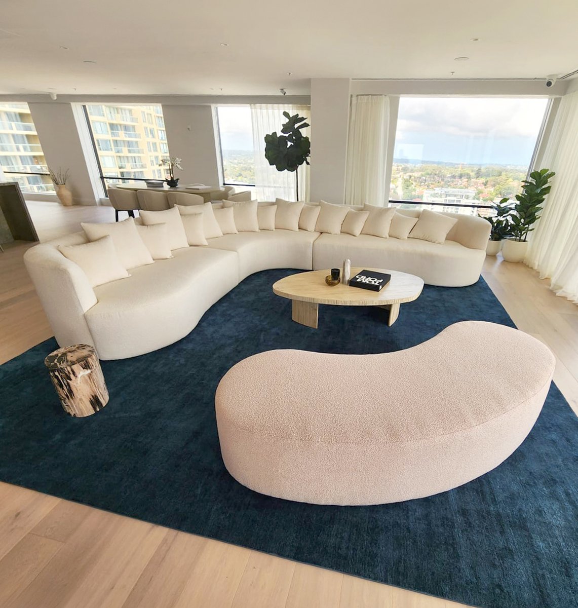 A bespoke lounge and ottoman manufactured for the LDF Chatswood project, designed by Team2 Architects

At 4 × 3.5m, the lounge was produced in three sections to accommodate lift access.

Designed as the centrepiece of the living area.

Made in-house at the Fineseat Factory.