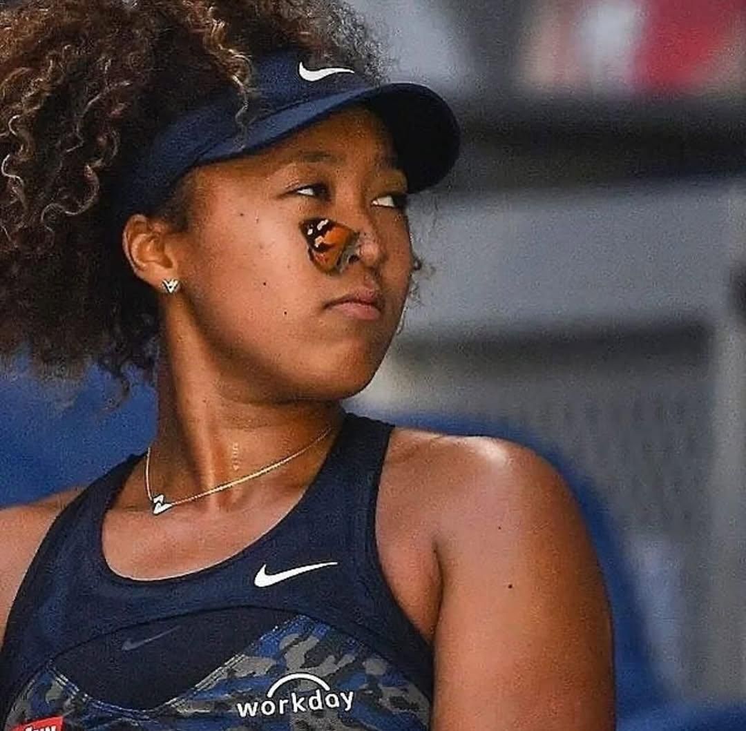 culturejpg's tweet image. Naomi Osaka carefully removing a butterfly that landed on her nose while playing tennis