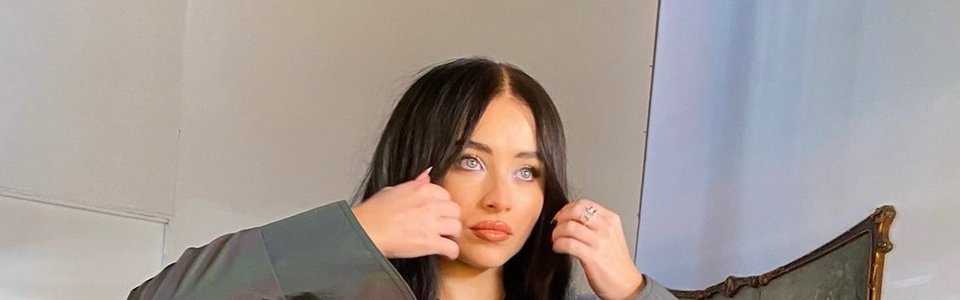 tap the post to reveal sabrina carpenter with dark hair