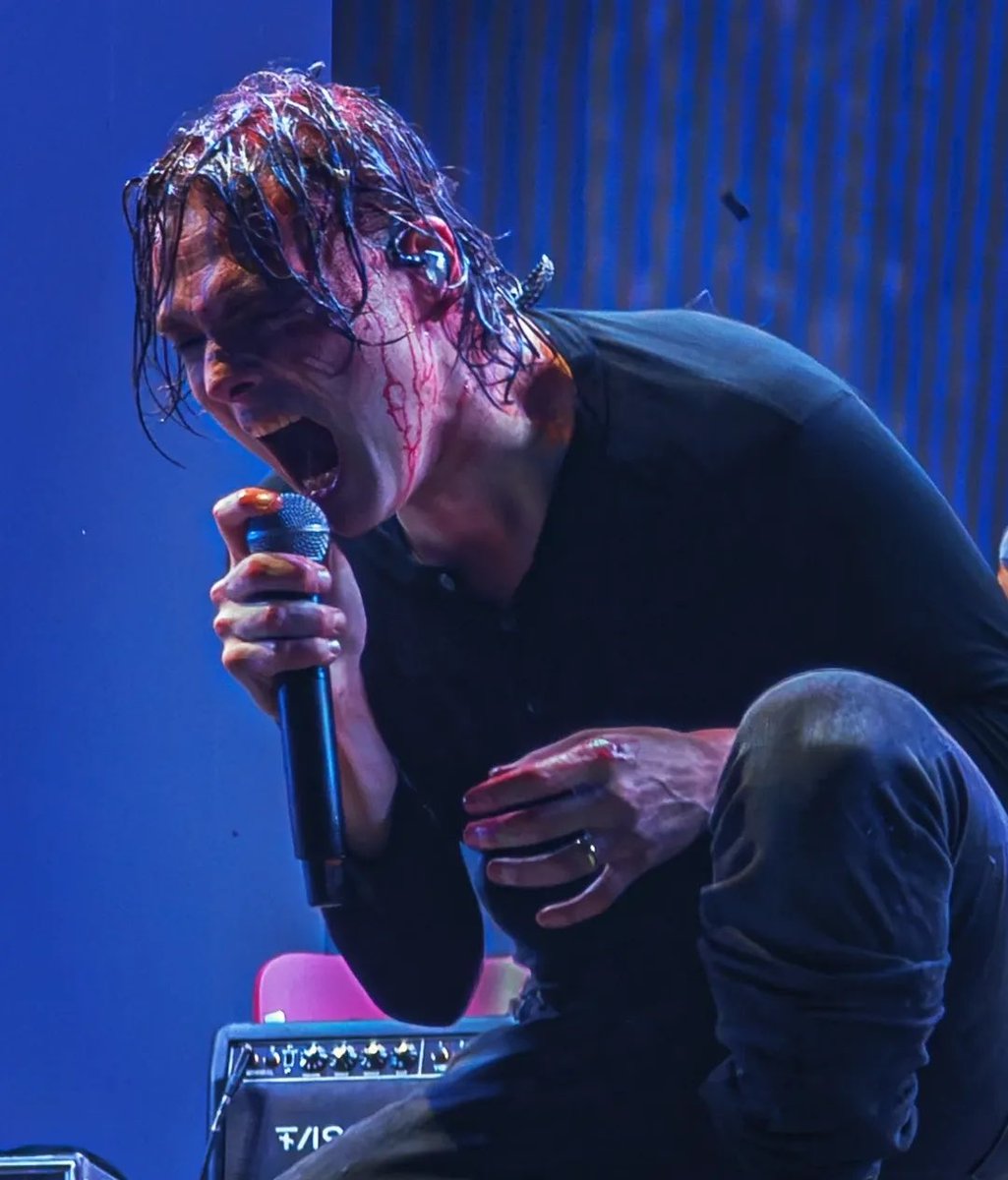 SOTSPodcast's tweet photo. Gerard Way (My Chemical Romance) drenched in blood during band's performance in Chile.

📷 fotochilero on IG https://t.co/zttqgfxXFr